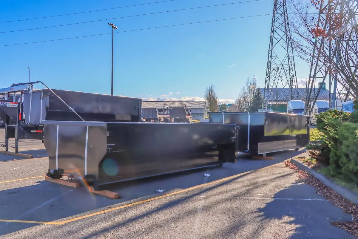 Roll-off dumpster ready for waste disposal at job site for 2 Yard Dumpster Rental in Plattsburgh